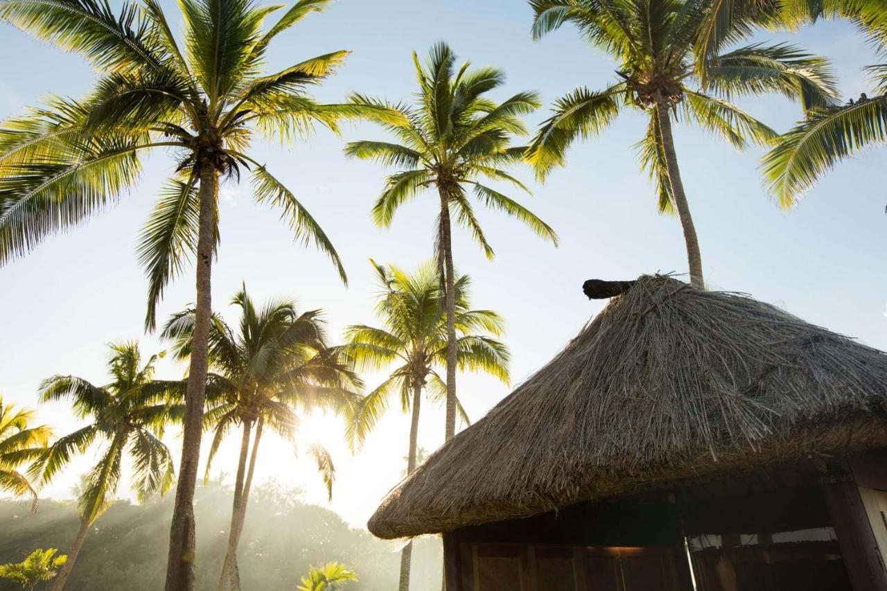Outrigger Fiji Beach Resort Korotogo Bagian luar foto A hut in the village of Avatele