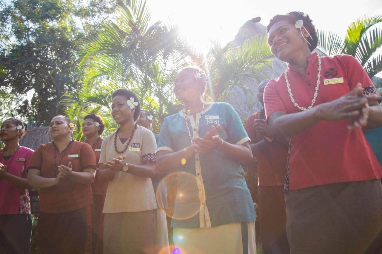 Outrigger Fiji Beach Resort Korotogo Bagian luar foto A group of people dancing in the Solomon Islands