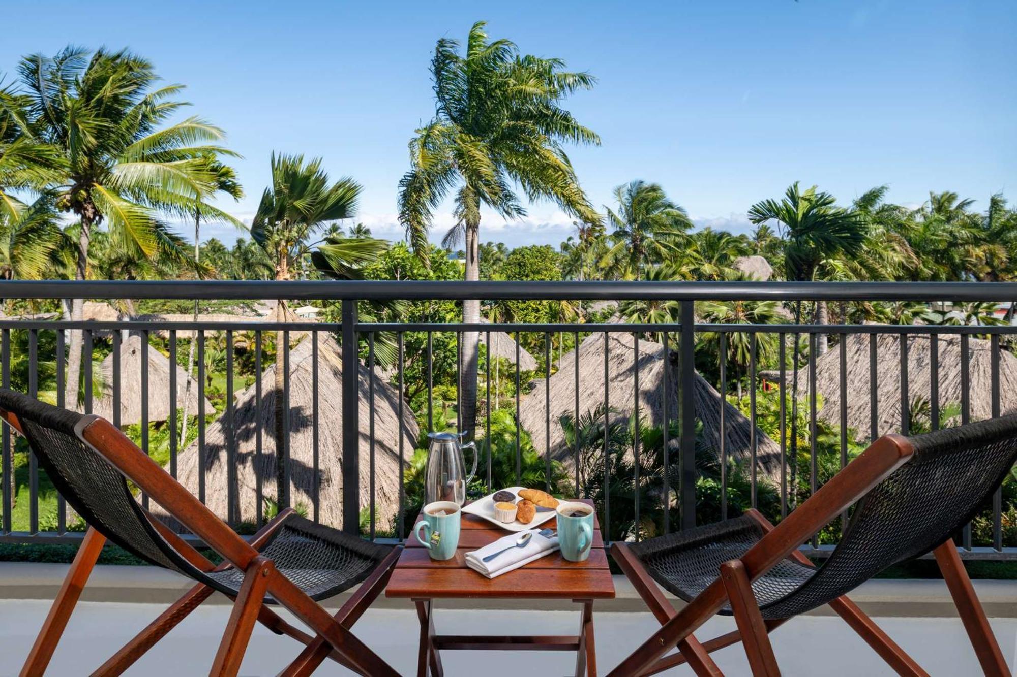 Outrigger Fiji Beach Resort Korotogo Bagian luar foto A balcony at the resort